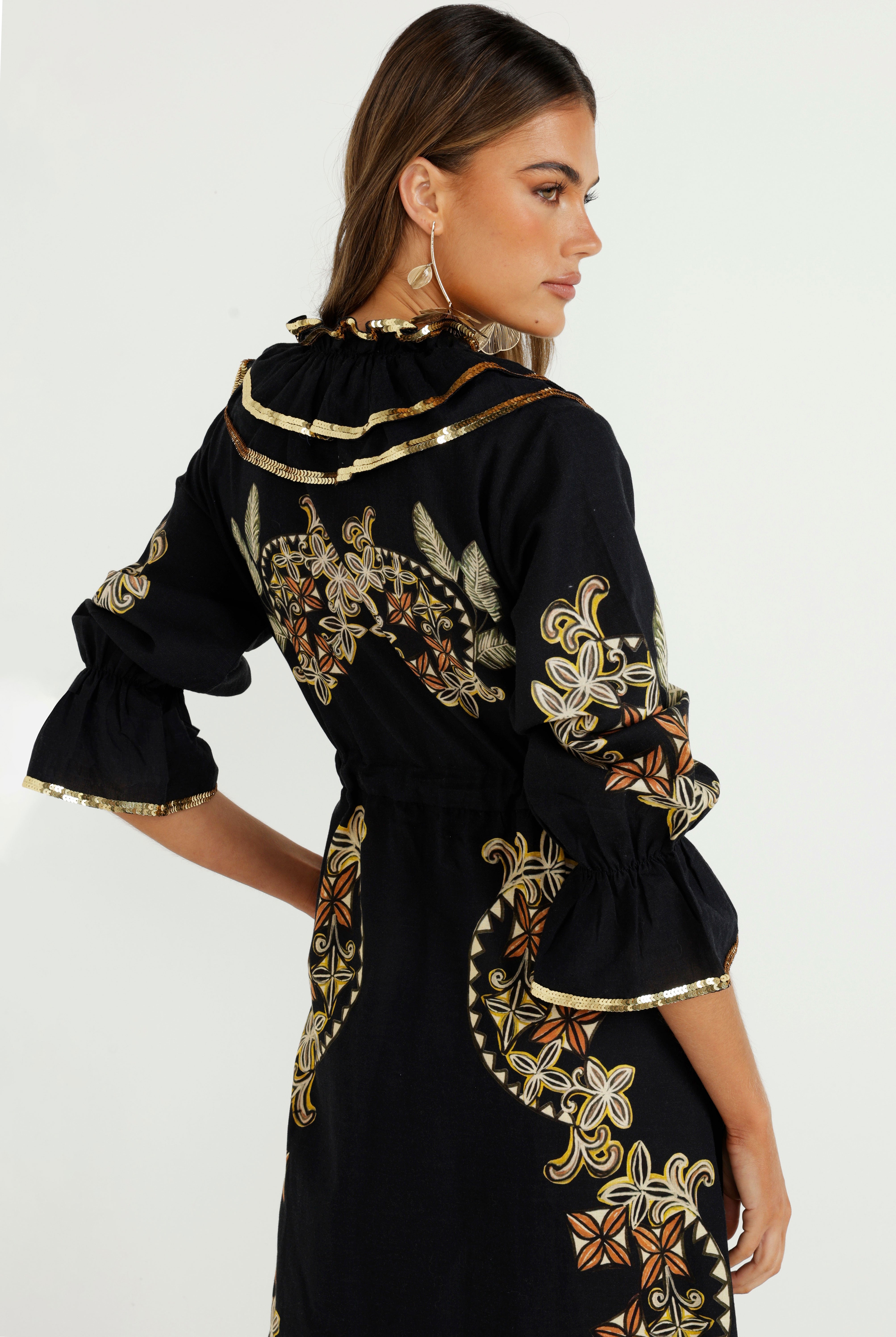 The Midnight Tropics Ruffle Dress